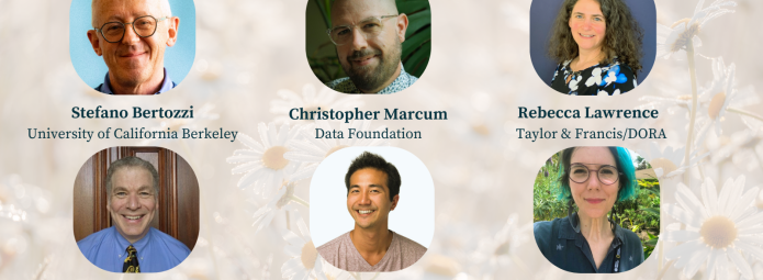 A black pencil with a red eraser rests on a spiral grid notebook. Eraser shavings are scattered on the open page, and the wooden surface underneath is visible.